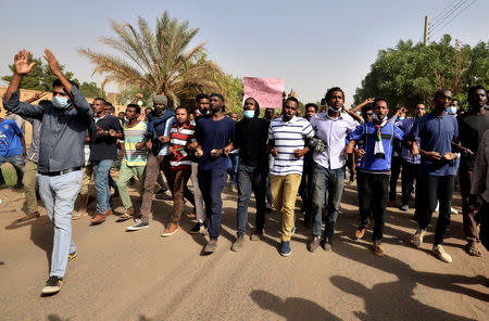Sudanese demonstrators chant slogans as they participate in anti-government protests in Khartoum, Sudan January 17, 2019. REUTERS/Mohamed Nureldin Abdallah