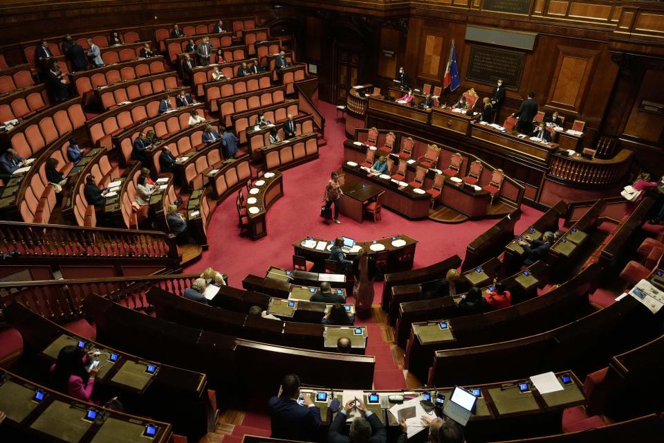 FILE -- A view of Senate, before voting at a decree on various economics matters, in Rome, Thursday, July 14, 2022. The stability of Italian Premier Mario Draghi's coalition government is at risk because 5-Star lawmakers say they will not participate in a confidence vote in Parliament. Italy has seen dozens of governments since the end of World War II, so it's very accustomed to political crises, but the tumult now roiling its political parties is playing out differently as Premier Mario Draghi's future as the nation's leader hangs in the balance. (AP Photo/Gregorio Borgia)