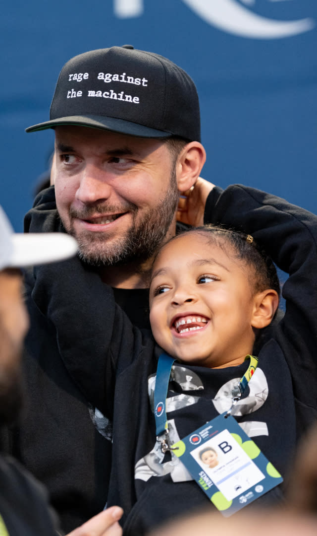 TORONTO, ON – AUGUST 10: Alexis Ohanian and Alexis Olympia Ohanian Jr. watch <span class="caas-xray-inline-tooltip"><span class="caas-xray-inline caas-xray-entity caas-xray-pill rapid-nonanchor-lt" data-entity-id="Serena_Williams" data-ylk="cid:Serena_Williams;pos:2;elmt:wiki;sec:pill-inline-entity;elm:pill-inline-text;itc:1;cat:Athlete;" tabindex="0" aria-haspopup="dialog"><a href="https://search.yahoo.com/search?p=Serena%20Williams" data-i13n="cid:Serena_Williams;pos:2;elmt:wiki;sec:pill-inline-entity;elm:pill-inline-text;itc:1;cat:Athlete;" tabindex="-1" data-ylk="slk:Serena Williams;cid:Serena_Williams;pos:2;elmt:wiki;sec:pill-inline-entity;elm:pill-inline-text;itc:1;cat:Athlete;" class="link ">Serena Williams</a></span></span> during her National Bank Open tennis tournament second round match on August 10, 2022, at Sobeys Stadium in Toronto, ON, Canada. <em>Photo by Julian Avram/Icon Sportswire via Getty Images.</em>