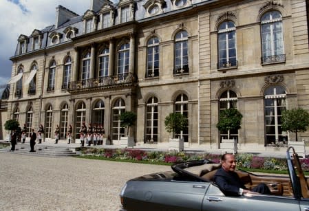 FILE PHOTO: New French conservative President Jacques Chirac seen in his Citroen-Maserati convertible (SM) as he..