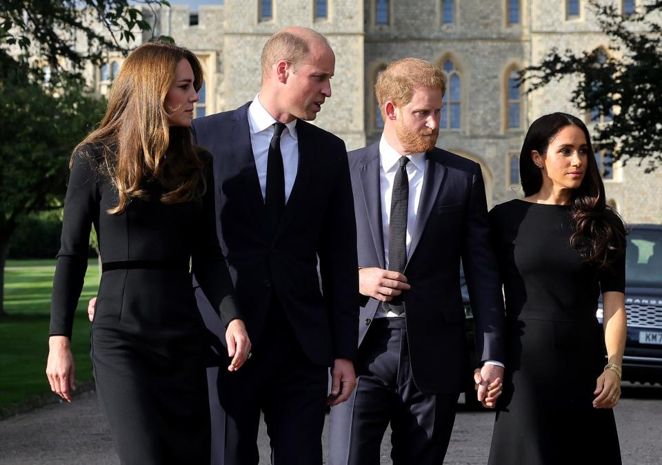 Catherine, Princess of Wales, Prince William, Prince of Wales, Prince Harry, Duke of Sussex, and Meghan, Duchess of Sussex on the long Walk at Windsor Castle arrive to view flowers and tributes to HM Queen Elizabeth on Saturday.