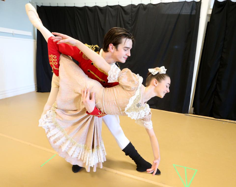 Caitlyn Gongwer, 15, an understudy for the part of Marie, and Fred Stuckwisch, 17, as the Nutcracker, rehearse the snow scene in the Southold Dance Company's production of "The Nutcracker" on Nov. 21, 2022, at the Colfax Cultural Center in South Bend.