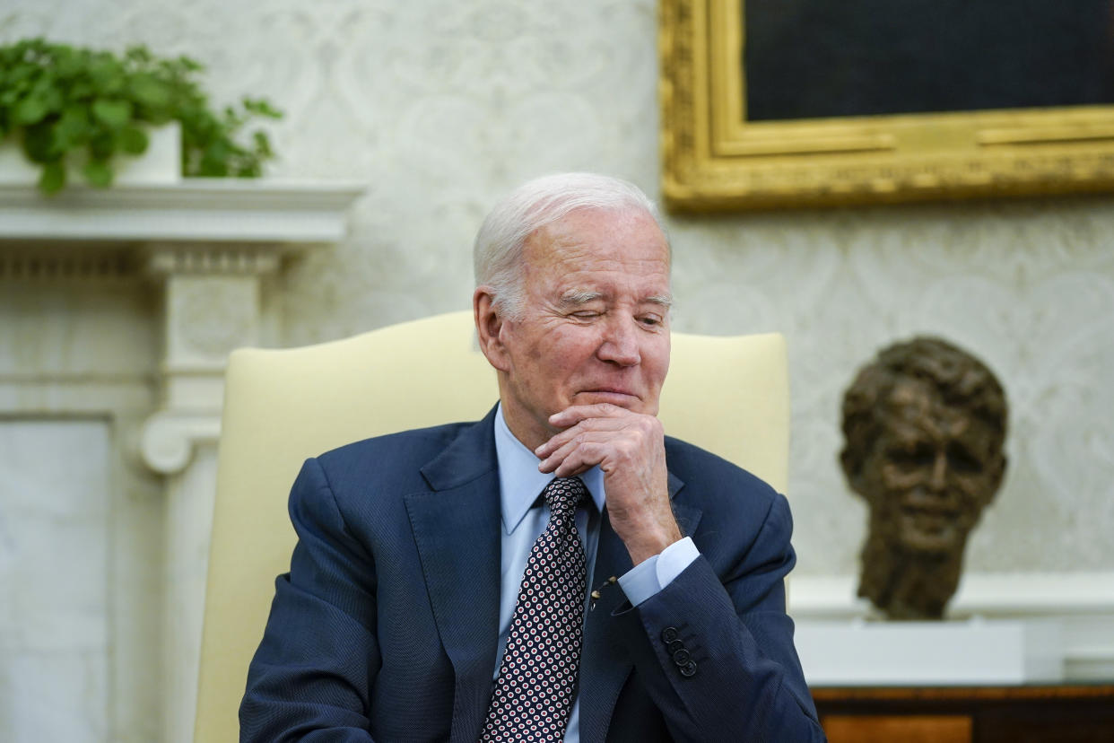 President Joe Biden listens as he meets with House Speaker Kevin McCarthy of Calif., to discuss the debt limit in the Oval Office of the White House, Monday, May 22, 2023, in Washington. (AP Photo/Alex Brandon)