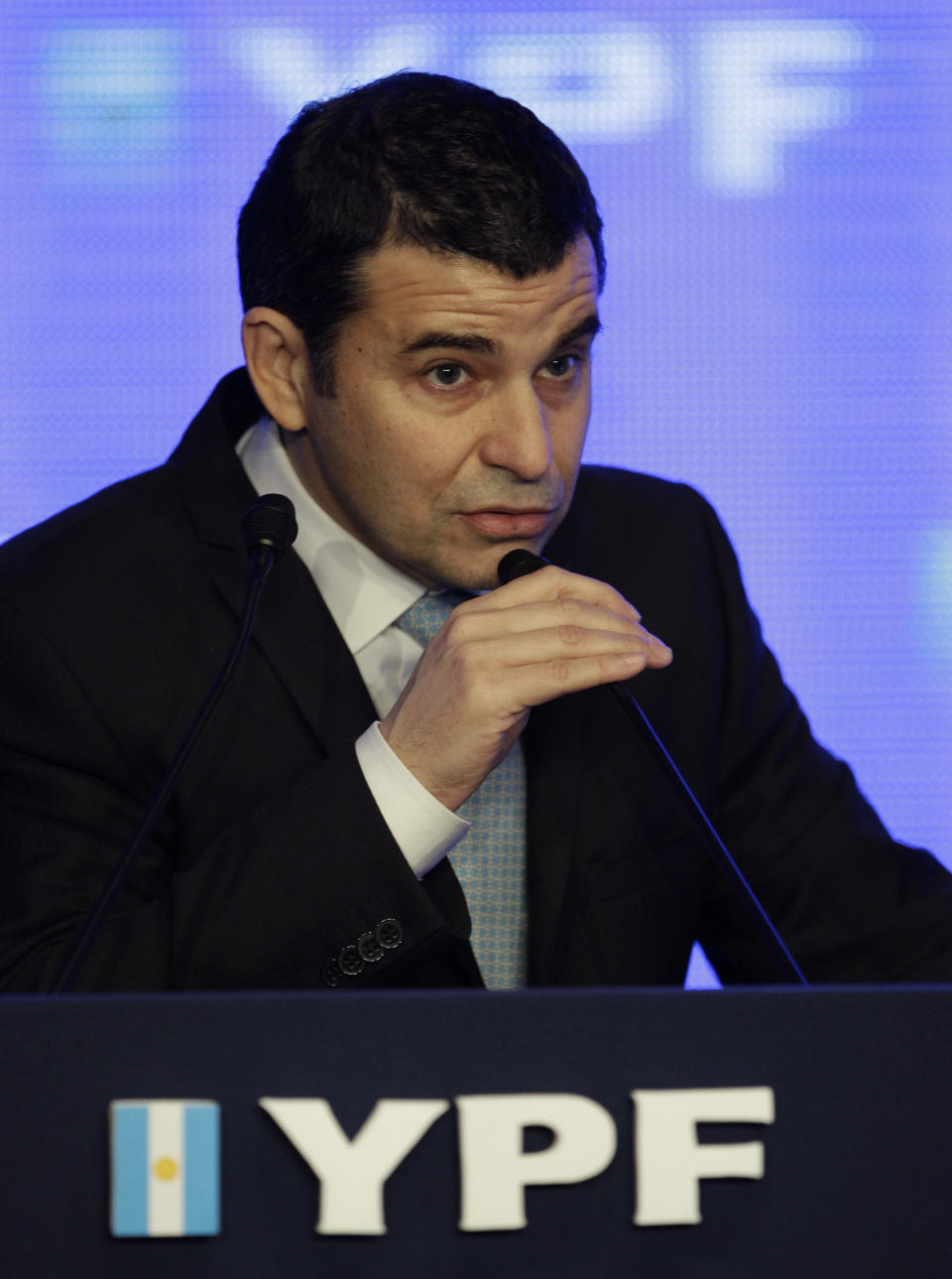 The chief executive of the newly state-controlled Argentine energy company YPF Miguel Galuccio delivers a speech during a ceremony to announce new investments in YPF in Buenos Aires, Argentina, Tuesday, June 5, 2012. Galuccio announced a five-year plan that includes an investment of up to $7 billion annually to expand exploration and boost production. (AP Photo/Natacha Pisarenko)