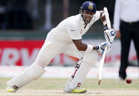 India's Stuart Binny plays a shot during the fourth day of their third and final test cricket match against Sri Lanka in Colombo August 31, 2015. REUTERS/Dinuka Liyanawatte