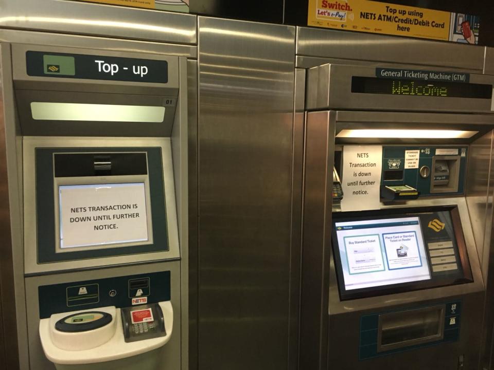 A NETS top-up machine and ticketing machine at Tanjong Pagar MRT station on 2 Feb 2018. NETS services were temporarily unavailable, said the e-payment provider on Friday. (Photo: Nicholas Yong/Yahoo News Singapore)