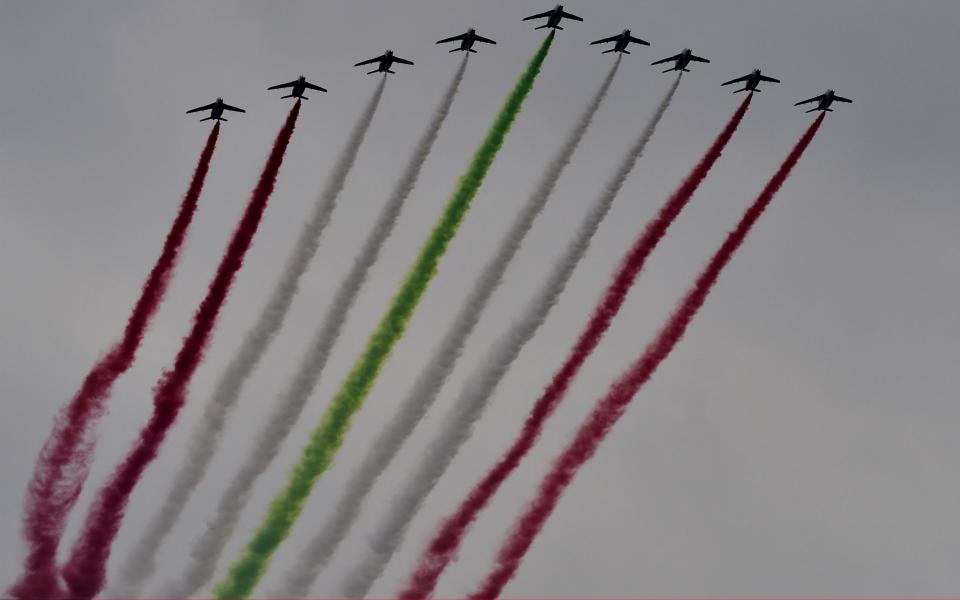 Jets of the Patrouille de France release smoke in the colours of the Lebanese flag as French President Emmanuel Macron visits Beirut, Lebanon -  Anadolu