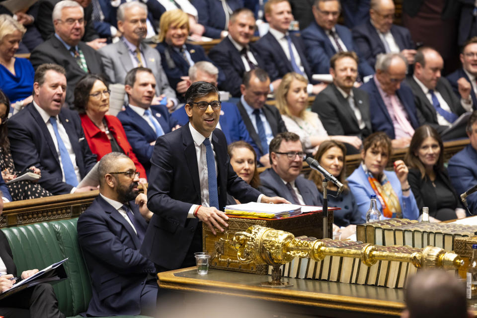 In this handout photo provided by the UK Parliament, Britain's Prime Minister Rishi Sunak speaks during Prime Minister's Questions in the House of Commons in London, Wednesday, March 22, 2023. (Roger Harris/UK Parliament via AP)