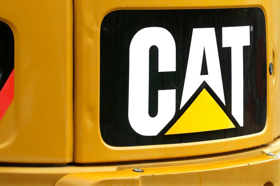 This June 10, 2014, file photo, shows the Caterpillar logo on heavy, earth-moving equipment in Springfield, Ill. (AP Photo/Seth Perlman, File)