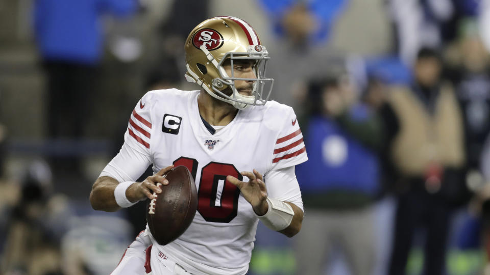 San Francisco 49ers quarterback Jimmy Garoppolo and his team want to wear the all-white throwbacks in Super Bowl LIV. (AP Photo/Stephen Brashear)