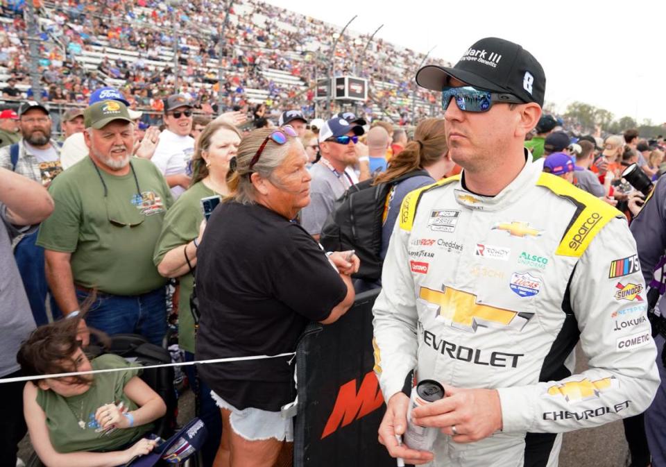 Apr 16, 2023; Martinsville, Virginia, USA; NASCAR Cup Series driver Kyle Busch (8) walks along fans during prerace festivities before the NOCO 400 at Martinsville Speedway. Mandatory Credit: John David Mercer-USA TODAY Sports