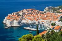 <p>Known as the <a href="http://www.thedailymeal.com/adriatic-luxury-hotels-croatia-are-giving-neighboring-european-countries-run-their-money" rel="nofollow noopener" target="_blank" data-ylk="slk:Pearl of the Adriatic;elm:context_link;itc:0;sec:content-canvas" class="link "><strong>Pearl of the Adriatic</strong></a>, Dubrovnik is a unique city still surrounded by its medieval walls. Head to the top of the wall and walk for a mile overlooking Dubrovnik’s Old Town on one side and the Adriatic Sea on the other. Stay at the boutique hotel Villa Orsula, where you’ll have views from your room of the sea and Old Town. Once owned by a local family, the hotel only has 13 rooms, making your experience even more exclusive and special.</p><p><a href="http://www.thedailymeal.com/travel/10-foods-they-eat-croatia" rel="nofollow noopener" target="_blank" data-ylk="slk:Click here for 10 foods they eat in Croatia;elm:context_link;itc:0;sec:content-canvas" class="link "><strong>Click here for 10 foods they eat in Croatia</strong></a>.</p>