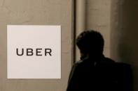 A man arrives at the Uber offices in Queens, New York, U.S., February 2, 2017. REUTERS/Brendan McDermid/Files