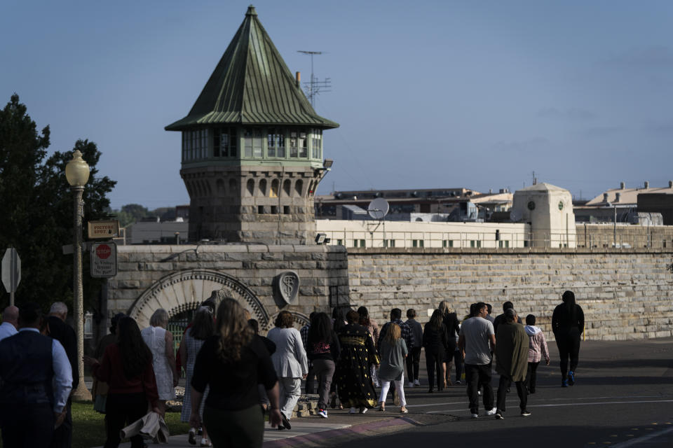 Family members and relatives of prisoner-students arrive to attend a graduation ceremony at Folsom State Prison in Folsom, Calif., Thursday, May 25, 2023. Advocates say college and other rehabilitative programming improve safety in the prisons for staff and the incarcerated population, reducing the number of violent incidents. (AP Photo/Jae C. Hong)