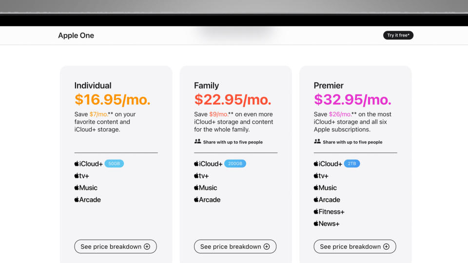 A laptop on a grey background showing the Apple One subscription pricing