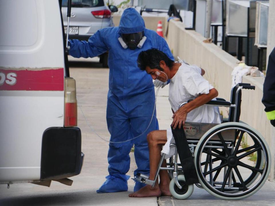 A COVID-19 patient is transported to a hospital where those seriously ill from the virus are treated in Cajamarca, Peru, on May 8, 2021.