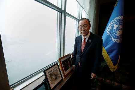 United Nations Secretary General Ban Ki-moon stands by his window as he poses for a portrait in his office at United Nations Headquarters in the Manhattan borough of New York, New York, U.S., October 21, 2016. REUTERS/Carlo Allegri