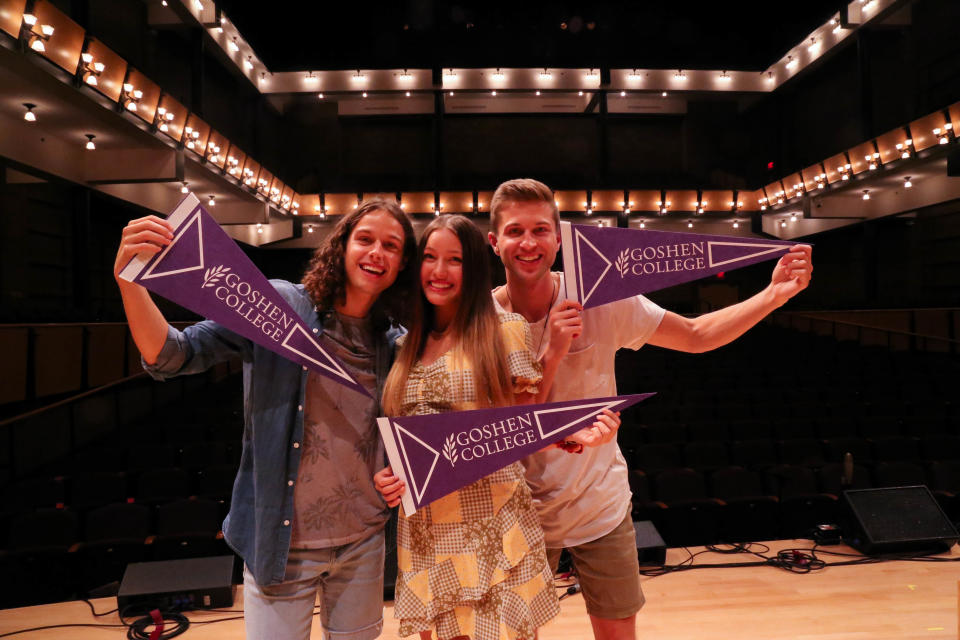 The South Bend-based sibling singing group Girl Named Tom — Joshua, left, Bekah and Caleb Liechty — show their school spirit at Caleb and Joshua's alma mater on Oct. 1, 2021, the day they played Goshen College's Sauder Concert Hall less than a week after passing the blind audition round on "The Voice" to advance to the competitive rounds. The group won "The Voice" on Dec. 14, 2021.