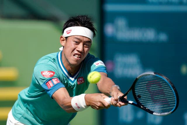 Kei Nishikori stretches for a backhand