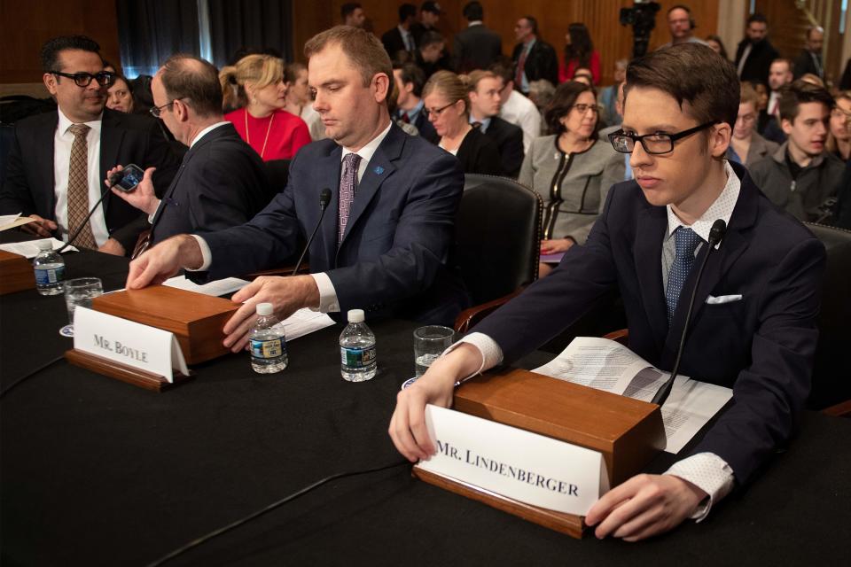 CEO of the Immune Deficiency Foundation John G. Boyle, center, and Ethan Lindenberger (R), student at Norwalk High School in Norwalk, Ohio, who confided in a now-viral Reddit post that he had not been fully vaccinated due to his mother's belief that vaccines are dangerous, speaks before the Senate Committee on Health, Education, Labor and Pensions on Capitol Hill in Washington, DC, on March 5, 2019. (Photo: Jim Watson/AFP/Getty Images)