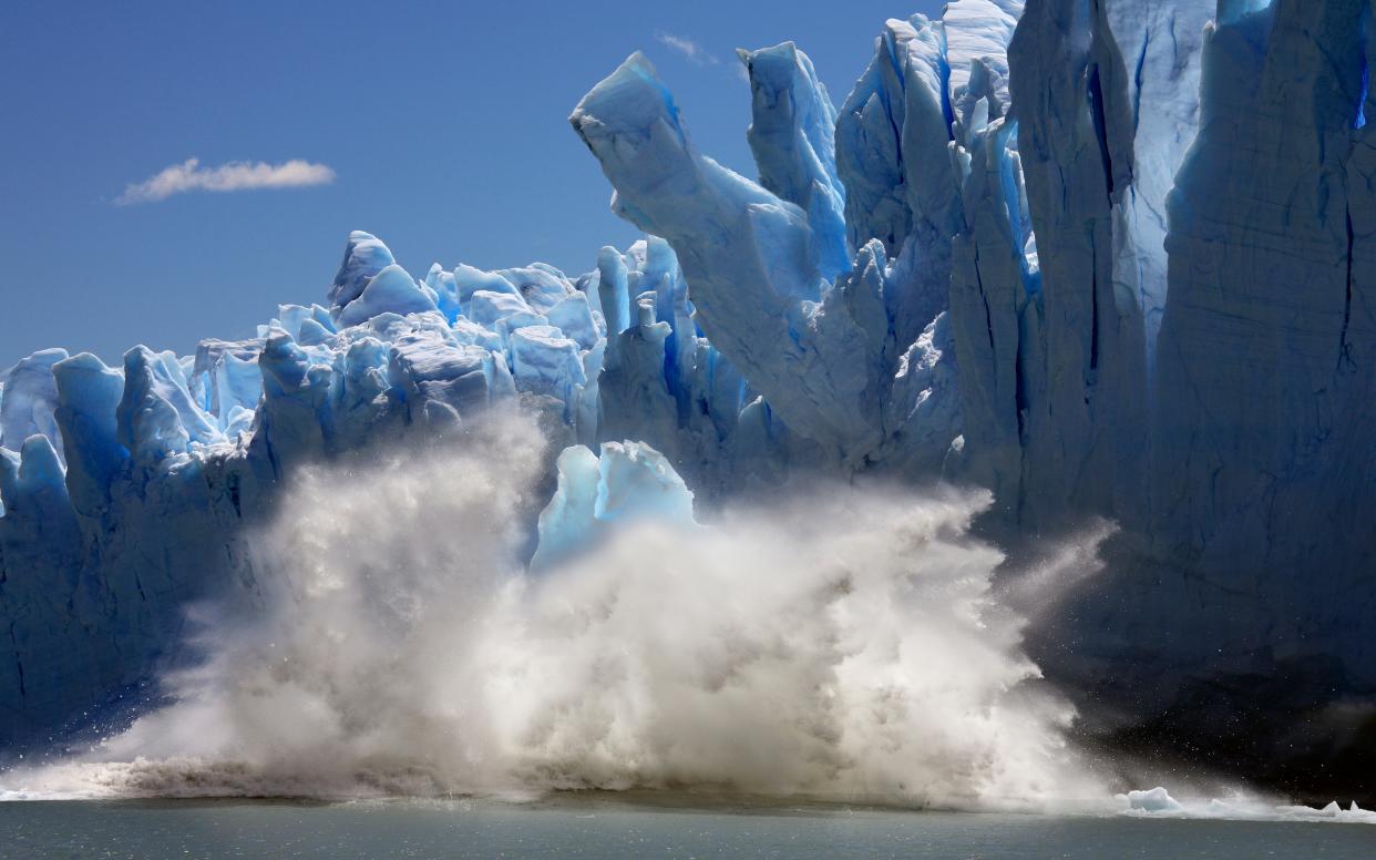 Vast icebergs tumble off the 60m high Perito Moreno Glacier - STEVE ALLEN