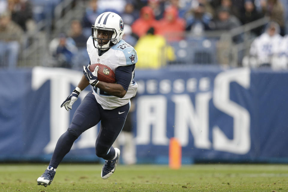 FILE - Tennessee Titans running back Leon Washington carries the ball during the second half of an NFL football game against the Indianapolis Colts on Dec. 28, 2014, in Nashville, Tenn. Washington was a dynamic running back in the NFL and an All-Pro kick. His competitive nature has taken him from the playing fields to the sidelines as a coach. Washington is an assistant with the New York Jets and works with special teams and running backs. (AP Photo/Sanford Myers, File)