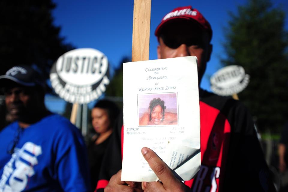 Portland police Officer Scott McCollister fatally shot Kendra James during a traffic stop. When McCollister pulled over the car in which James was a passenger, he took the driver, Terry Jackson, into custody after seeing he had an outstanding warrant. James moved behind the wheel of the car and tried to drive away, and McCollister tried to stop her by climbing partway&nbsp;into the car and <a href="http://www.portlandoregon.gov/police/article/33708" target="_blank">pulling her hair and using pepper spray and a Taser</a>. James put the car into drive and McCollister shot her. He later claimed he'd gotten stuck in the car's doorway and that he'd feared for his life.<br /><br />A grand jury declined to prosecute. McCollister&nbsp;was <a href="http://www.oregonlive.com/portland/index.ssf/2013/04/memorial_planned_to_mark_10-ye.html" target="_blank">initially suspended</a>, but the disciplinary action was overturned by an arbitrator.<br /><br />&ldquo;It&rsquo;s been 10 years later, justice has still not [been] served,&rdquo; James&rsquo; mother, Shirley Isadore,&nbsp;<a href="http://koin.com/2013/05/05/kendra-james-remembered-at-portland-rally/" target="_blank">said at a 2013 rally</a> marking the anniversary of her daughter&rsquo;s death.