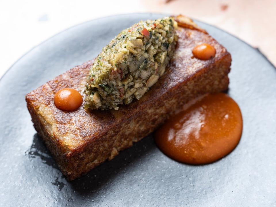 Starchy complexity: ekuru with pumpkin pesto and Scotch bonnet sauce (Daniel Hambury/Stella Pictures Ltd)