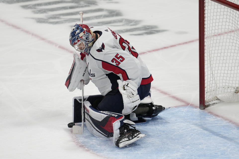 Washington Capitals goaltender Darcy Kuemper defends against a shot by the San Jose Sharks during the third period of an NHL hockey game in San Jose, Calif., Saturday, March 4, 2023. (AP Photo/Jeff Chiu)