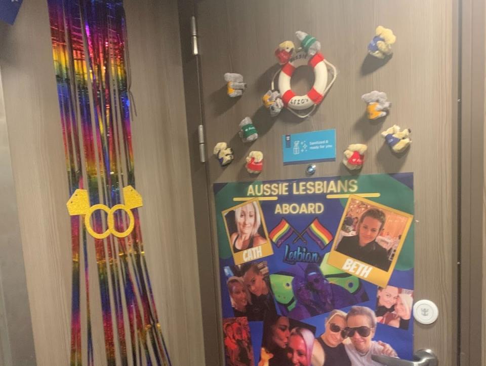 a lesbian aussie couple's door on the ship with rainbows and ducks