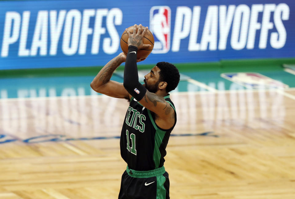 Boston Celtics' Kyrie Irving shoots against the Indiana Pacers during the first quarter in Game 1 of a first-round NBA basketball playoff series, Sunday, April 14, 2019, in Boston. (AP Photo/Winslow Townson)