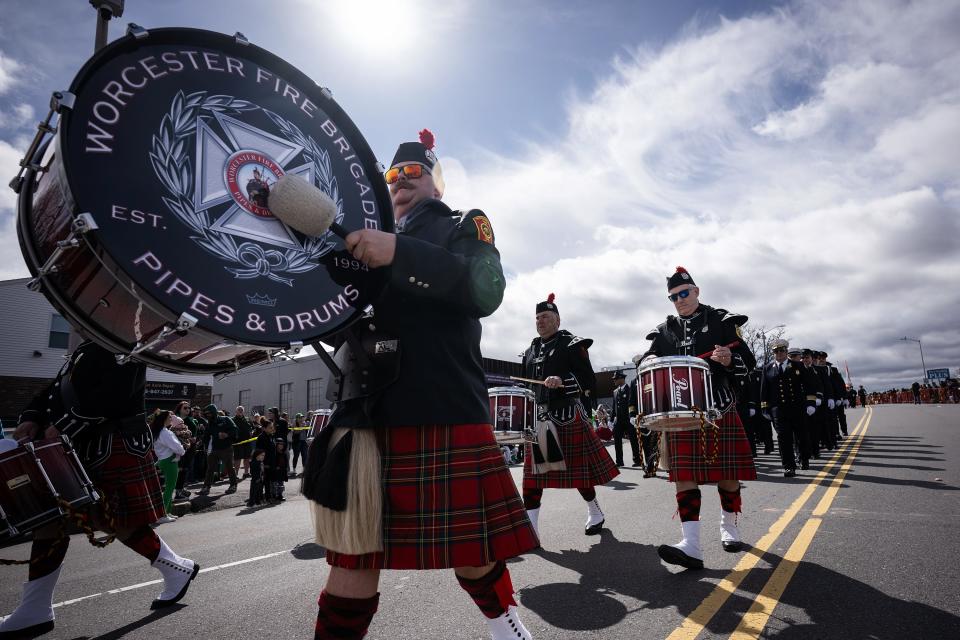 Worcester Fire Pipes & Drums march during the Worcester County St. Patrick’s Parade Sunday.