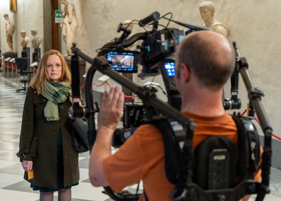 Albertson walks through the halls of the Uffizi Gallery in Florence.