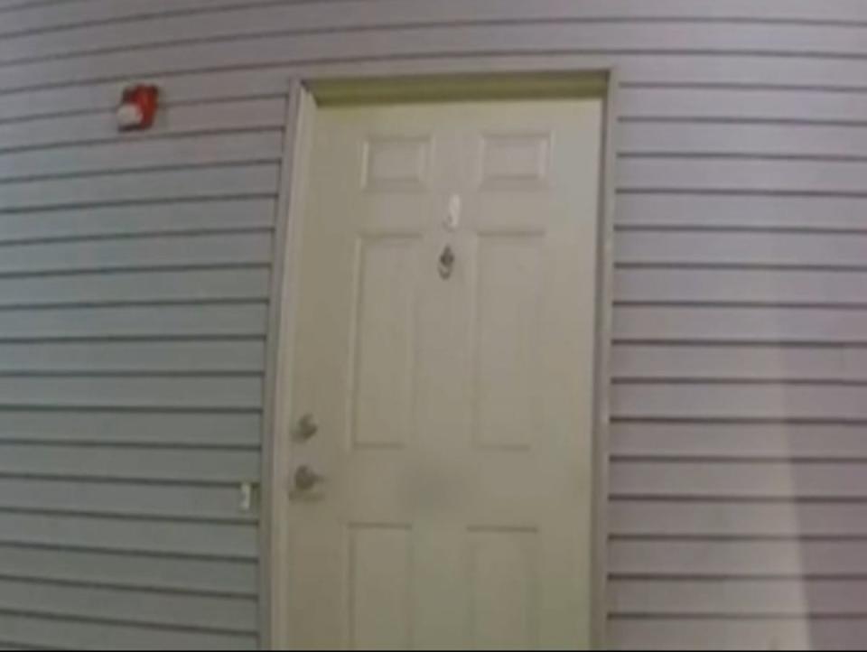 An image of a door in the neighborhood where Sayreville City Councilwoman Eunice Dwumfour was shot and killed. The video captures the sound of the gunshots the night of her death (Screengrab/ 12 News New Jersey)