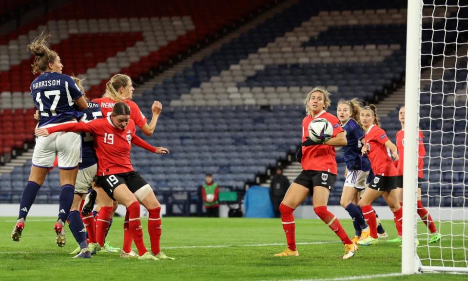 Austria’s defenders look on powerlessly as Abigail Harrison’s header goes towards the net.