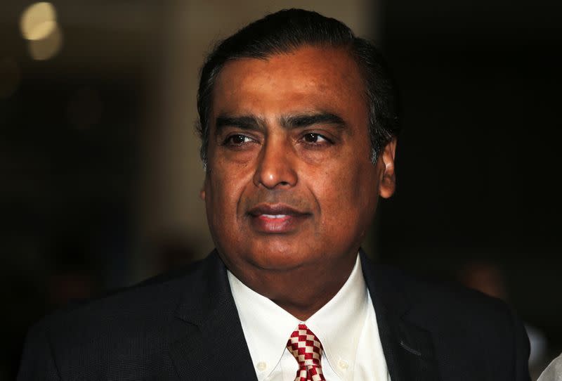 FILE PHOTO: Mukesh Ambani, Chairman and Managing Director of Reliance Industries, arrives to address the company's annual general meeting in Mumbai