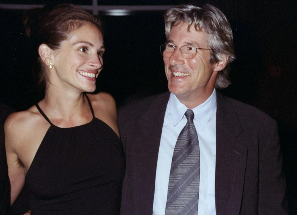 <p>Roberts reunites with <i>Pretty Woman </i>costar Richard Gere as he receives a leadership award from Amnesty International on September 28, 1998. The two would team up again the following year in the comedy <i>Runaway Bride. </i>(Photo: Getty Images)</p>