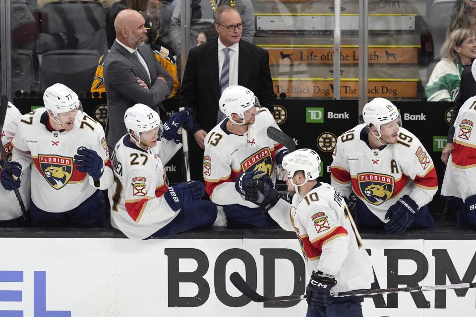 Florida Panthers' Vladimir Tarasenko (10) is congratulated for a goal against the Boston Burins, as coach Paul Maurice, back right, watches during the second period in Game 3 of an NHL hockey Stanley Cup second-round playoff series Friday, May 10, 2024, in Boston. (AP Photo/Michael Dwyer)