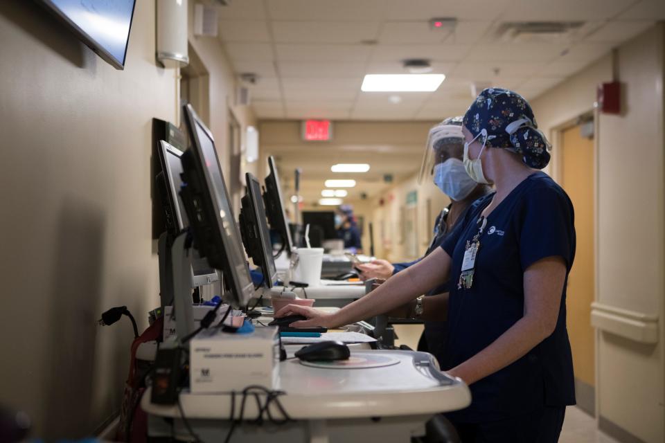 Nurses work the floor at ChristianaCare Wilmington Hospital Thursday, Jan. 27, 2022. 
