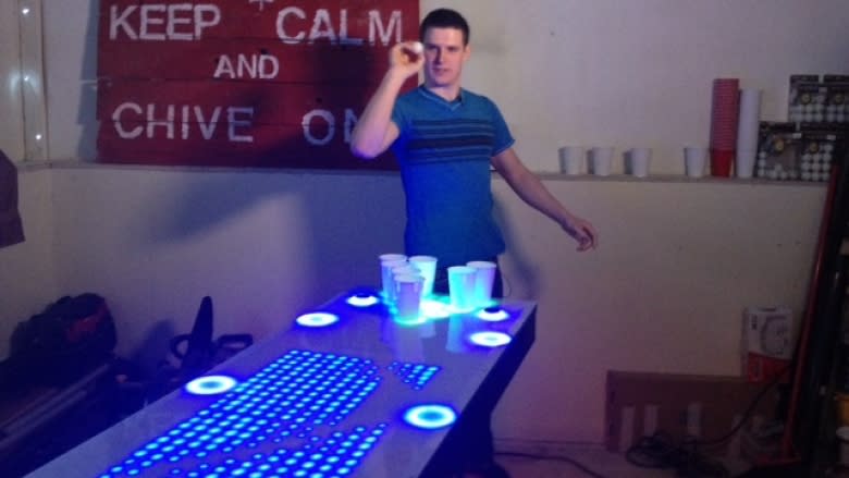 Jeff Nybo's interactive beer pong table a social media sensation