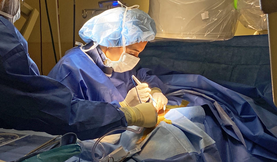 Dr. Kiran Patel preformed a 45-minue surgery on Dennis Bassett to insert a device into his back to help ease his back pain. (Courtesy Northwell Health)