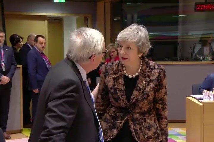 Theresa May face to face with Jean-Claude Juncker