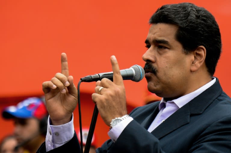 Venezuelan President Nicolas Maduro delivers a speech during a rally outside Miraflores presidential palace in Caracas on June 22, 2016