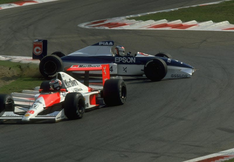 Jean Alesi of France spins off the track in his Tyrrell Cosworth during the 1990 Italian Grand Prix. 