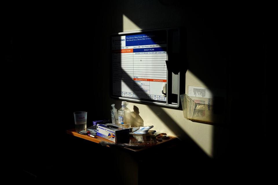 The sun beams across medical supplies in an intensive care room on Tuesday, Feb. 9, 2021, at Providence Holy Cross Medical Center in Los Angeles.