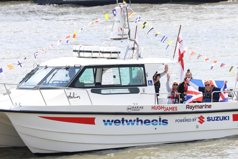 Wetwheels with Geoff Holt waving flag