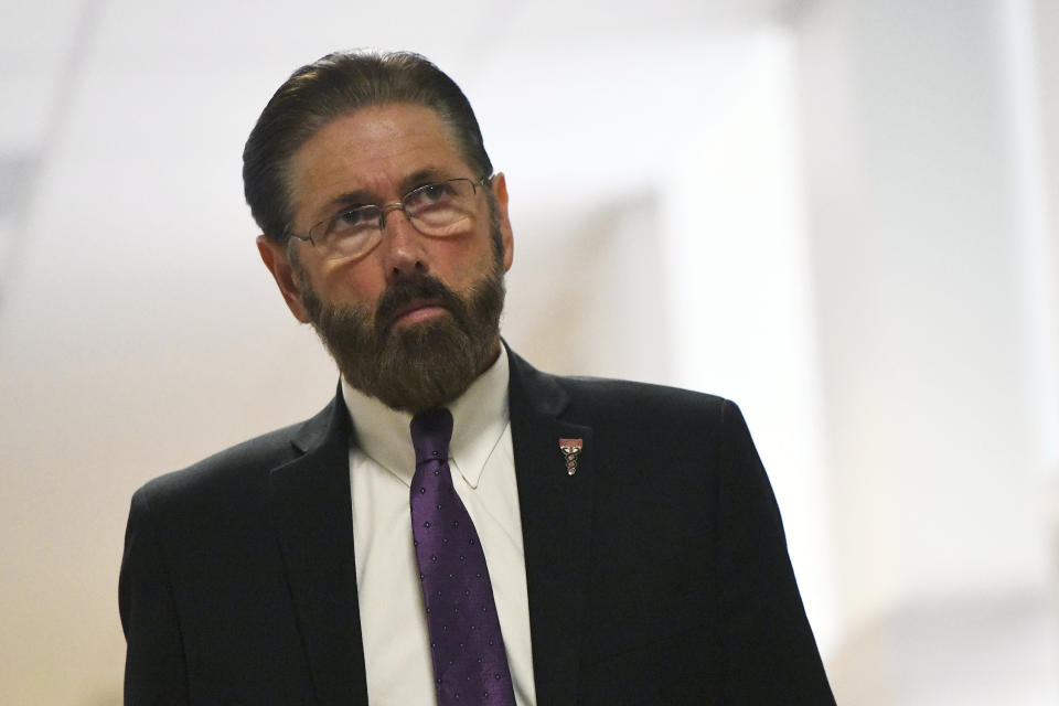 Montgomery County Judge Steven O'Neill walks towards the courtroom on the second day of Bill Cosby's sentencing hearing on Tuesday, Sept. 25, 2018, in Norristown, Pa. (Mark Makela/Pool Photo via AP)