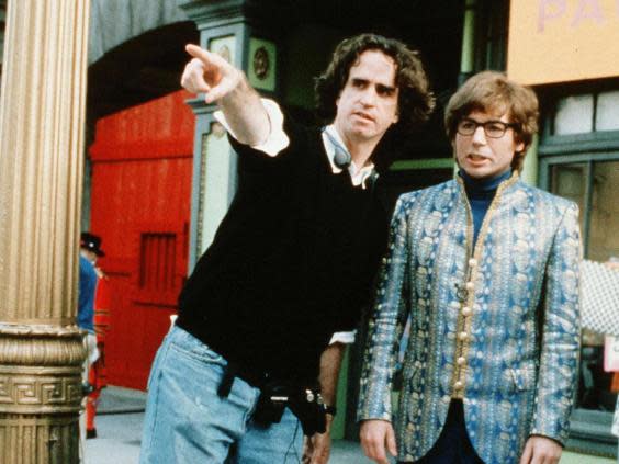 Jay Roach and Mike Myers on the film’s set in 1999 (Rex)