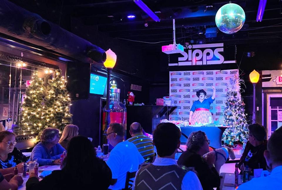 Estelle Suarez hosts bingo at Sipps Bar in Gulfport on Thanksgiving Day 2022. Justin Mitchell/jmitchell@mcclatchy.com