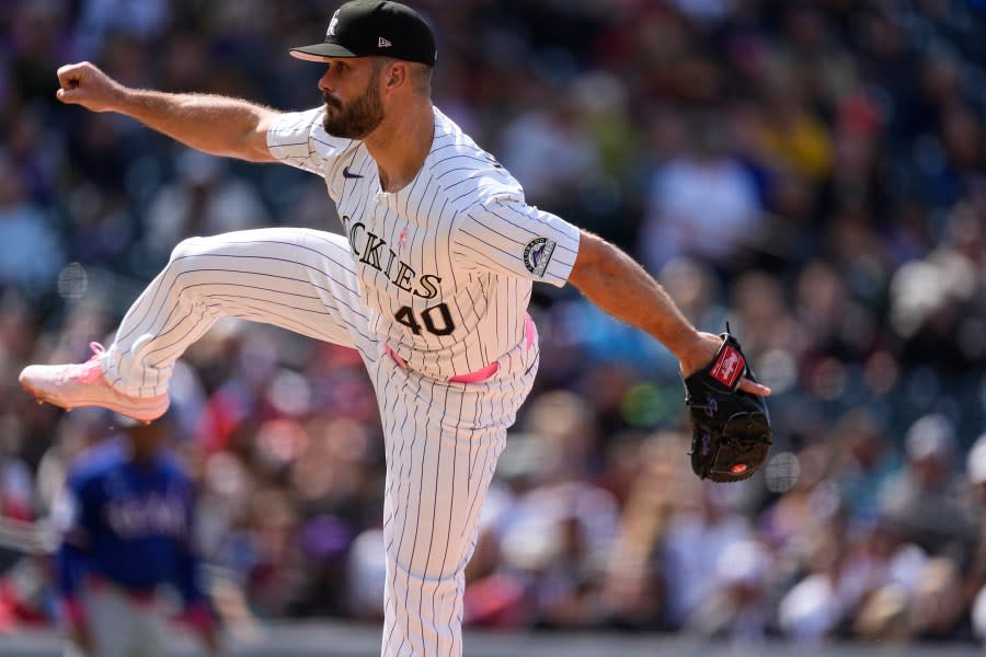 Colorado Rockies relief pitcher Tyler Kinley works against the Texas Rangers in the eighth inning of a baseball game Sunday, May 12, 2024, in Denver. (AP Photo/David Zalubowski)